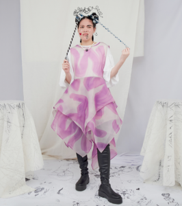 Chunky magnetic string of stones, handkerchief apron dress, puffed sleeve shirt