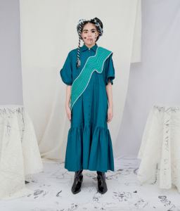 Puzzle sleeve dress and ring of trees sash bag